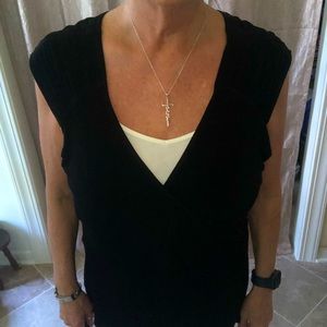 Posh show.   Chico ladies deep v neck, sleeveless top.​